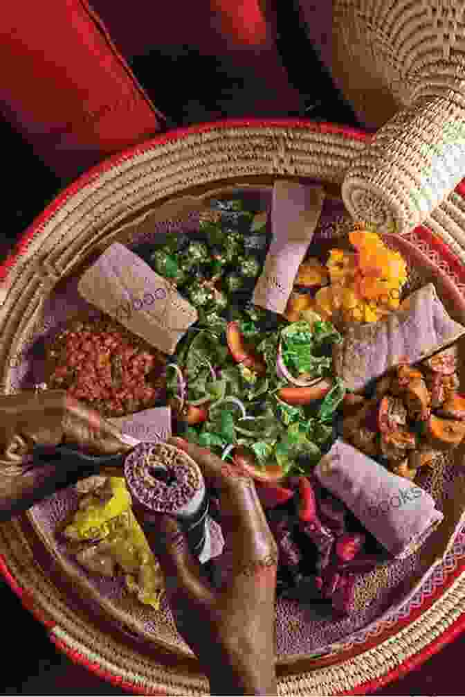 A Sizzling Plate Of Injera With A Vibrant Stew, Showcasing The Vibrant Colors And Textures Of Ethiopian Cuisine Easy Ethiopian Cooking: Simple Yet Delicious Ethiopian Recipes That Will Change Your World