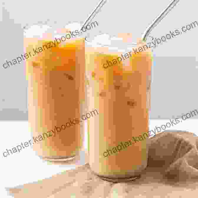 A Tall Glass Of Thai Iced Tea With Ice Cubes, Garnished With A Sprig Of Mint Thai Iced Tea Recipe: Non Alcohol Drinking (7777)